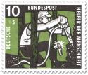 Stamp: Bergarbeiter im Schacht mit Abbauhammer