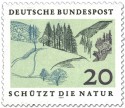 Stamp: Mittelgebirge mit Tannen