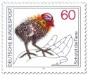 Stamp: Blässhuhn Küken auf einer Hand (Naturschutz)